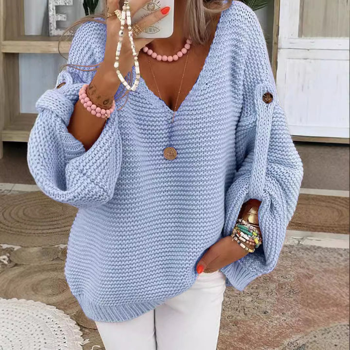 Women loose knit sweater with V-neck, balloon sleeves and button detail Mune Fashion