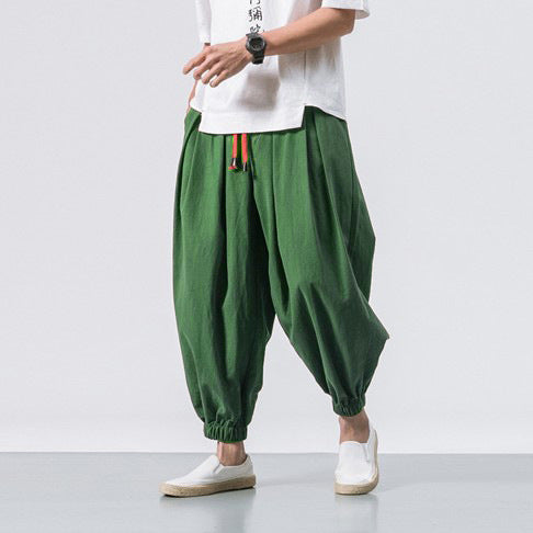 Men's unusual harem-style balloon pants with pleats, elastic waistband, and drawstring Mune Fashion