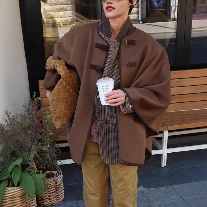 Women's Oversize Cape Coat made of wool blend with high stand-up collar and leather tabs Mune Fashion