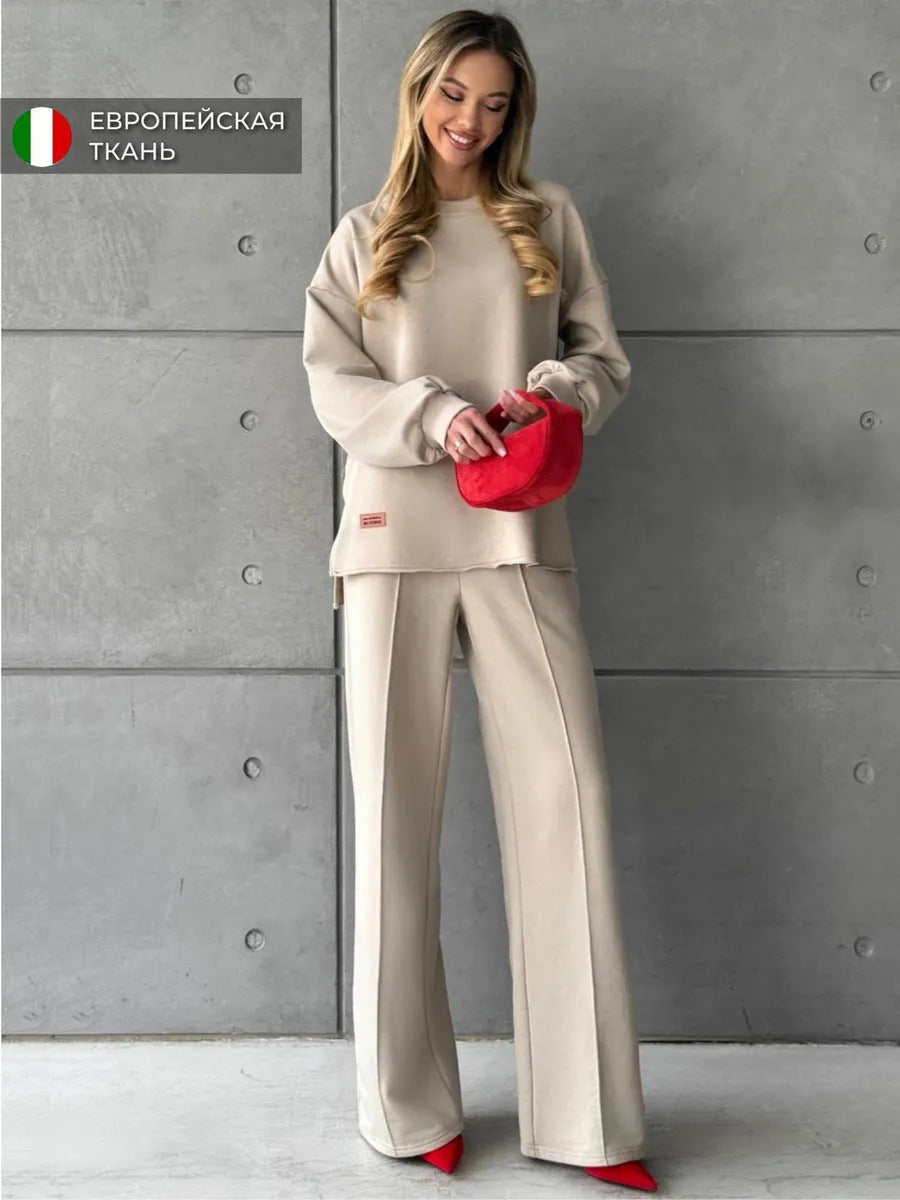 Women elegant lounge two-piece set with oversized sweatshirt and fitted wide-leg trousers Mune Fashion