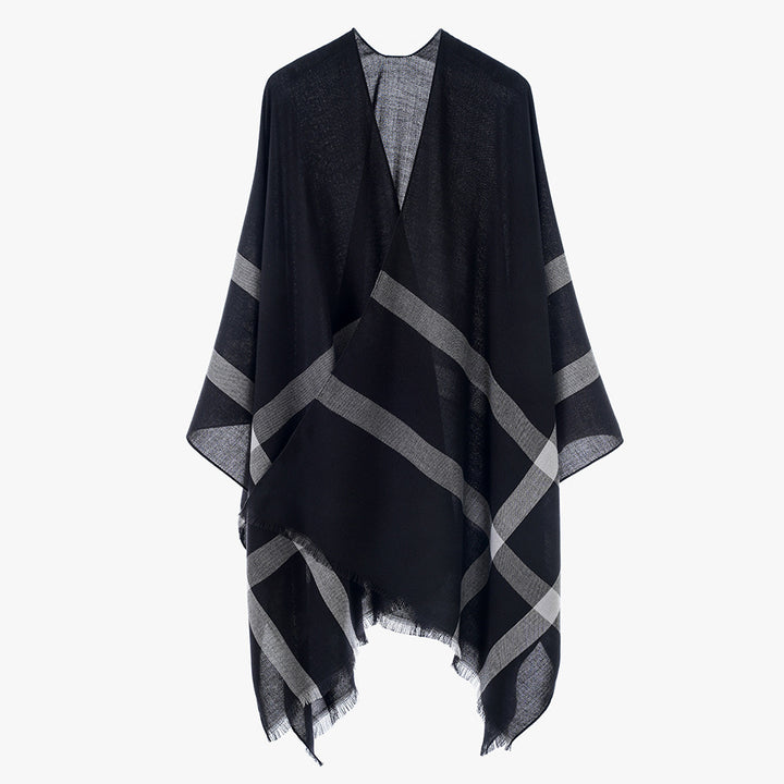 Women’s lightweight fine knit cape with diagonal contrasting stripes and fringes Mune Fashion