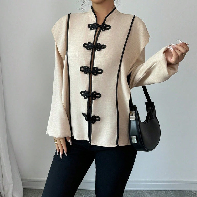 Women's stand-up collar blouse with decorative knot closures and decorative piping Mune Fashion