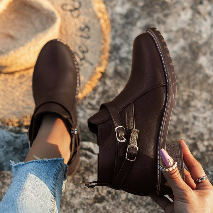 Women's ankle boot with double decorative straps, profiled tractor sole and low block heel Mune Fashion