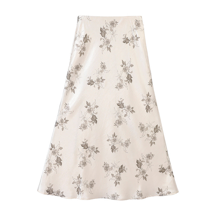 Women's high-waisted A-line midi skirt in jacquard-like satin with floral relief print.