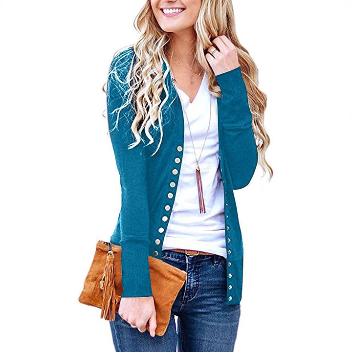 Women's fine knit cardigan with decorative metallic buttons and slim silhouette Mune Fashion