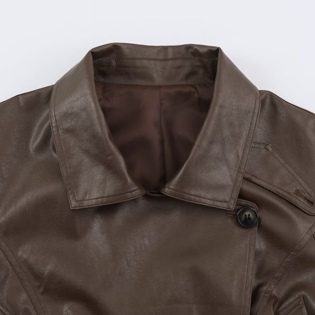 Women's short jacket in leather look with tie belt and asymmetrical button placket Mune Fashion