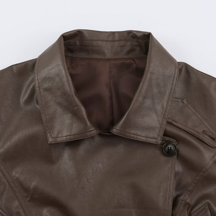 Women's short jacket in leather look with tie belt and asymmetrical button placket Mune Fashion