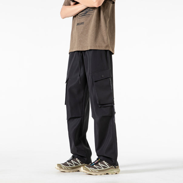 Herren Baggy‑Cargohose im Tech‑Utility‑Stil mit elastischem Tunnelzugbund, großen Klappfächern und Zipper‑Details Mune Fashion