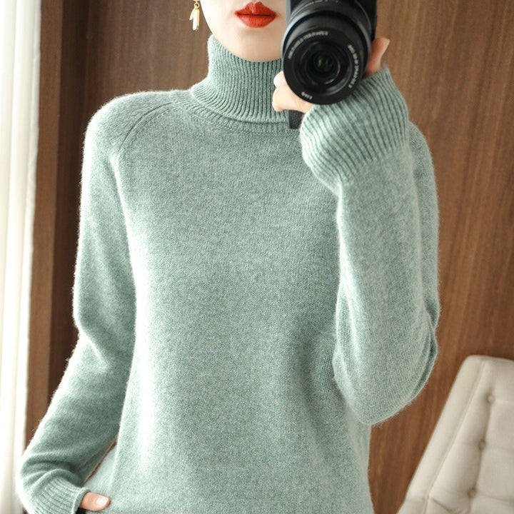 Women's turtleneck sweater made of soft wool blend with extended cuffs Mune Fashion