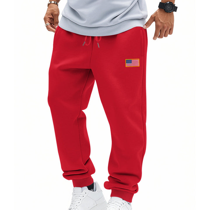 Men's trendy joggers with elastic drawstring waistband, ribbed cuffs, and discreet flag application Mune Fashion