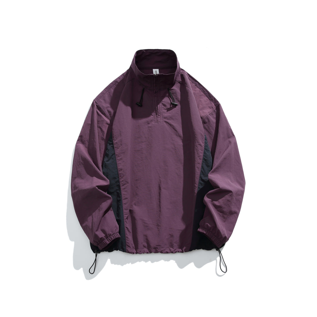 Men's lightweight nylon anorak with half-zip, drawstring hem, and raglan sleeves Mune Fashion