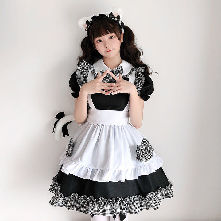 Ladies playful maid dress with ruffle details and bows Mune Fashion