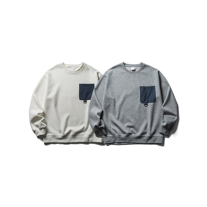 Unisex Oversize Sweatshirt with contrasting chest pocket and D-ring Mune Fashion
