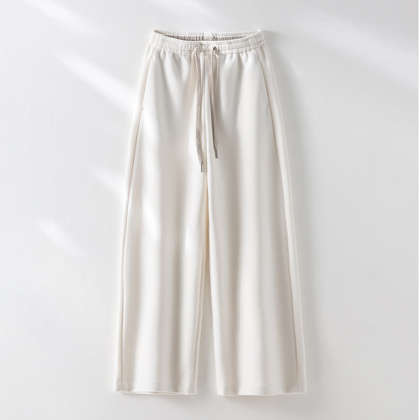 Women's Loose Sweatpants with Elastic Waistband, Drawstring and Side Pockets Mune Fashion