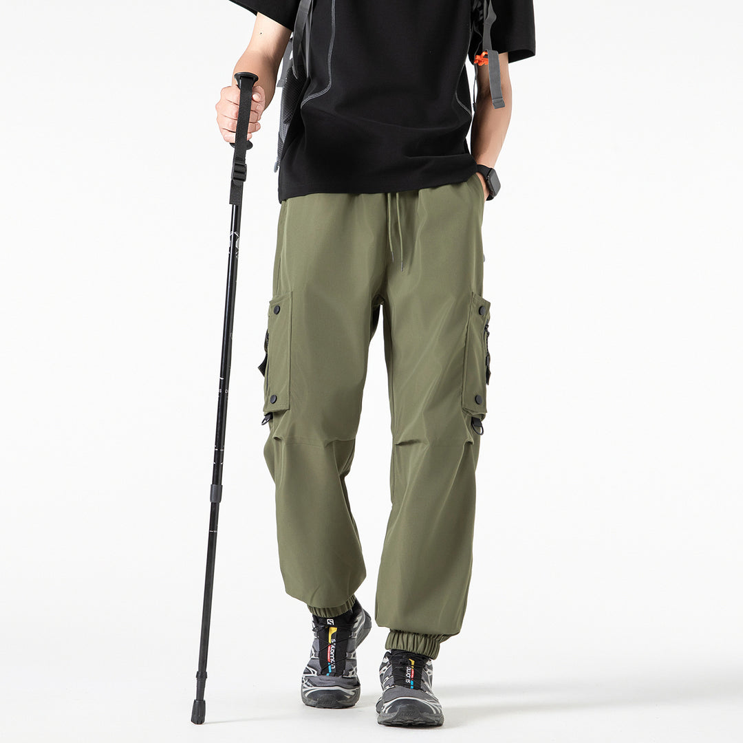 Men's Wide Technical Cargo Jogger with elastic drawstring waistband, multifunctional cargo pockets and adjustable leg openings Drune