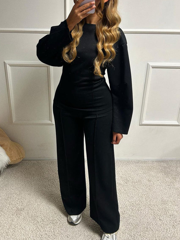 Women's soft lounge set with fitted sweatshirt, sculpting seam details, and wide palazzo pants leg Mune Fashion
