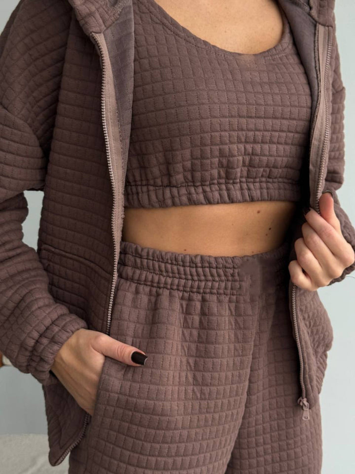 Women's quilted lounge two-piece set made of soft fleece with hooded zip jacket, high-waist pants, and bustier top Mune Fashion
