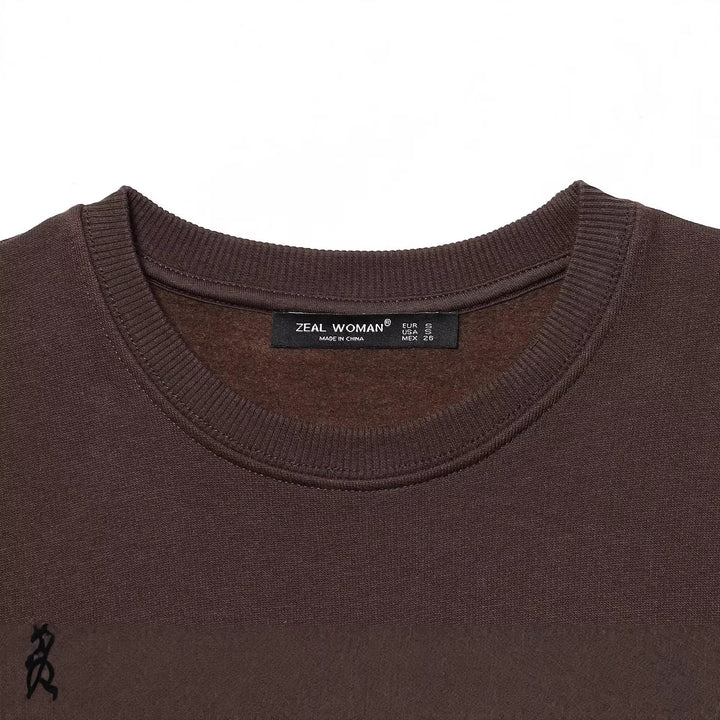 Women's wide sweatshirt with three-dimensional bow application and ribbed cuffs Mune Fashion