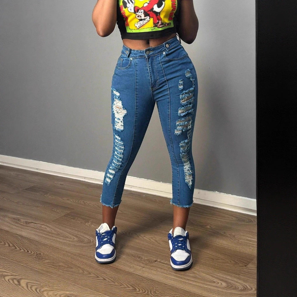 Women's high-cut ankle-length skinny jeans with generous rip details and raw hem Mune Fashion