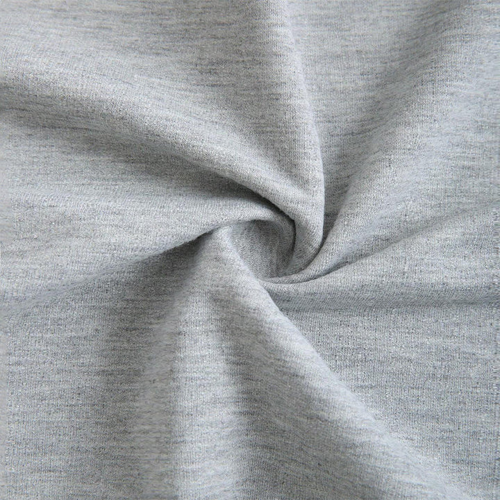 Women's cropped off-shoulder sweatshirt with one-sided strap, balloon sleeves, and ribbed cuffs.