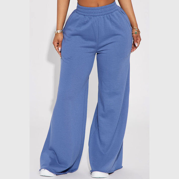 Ladies high-waist palazzo trousers made of French terry with wide legs, elastic comfort waistband and open hem edges Mune Fashion
