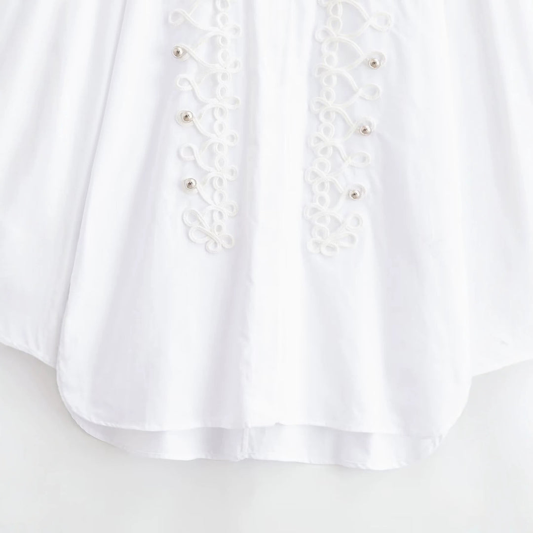 Ladies blouse with decorative frog closures and ornamental cords Mune Fashion