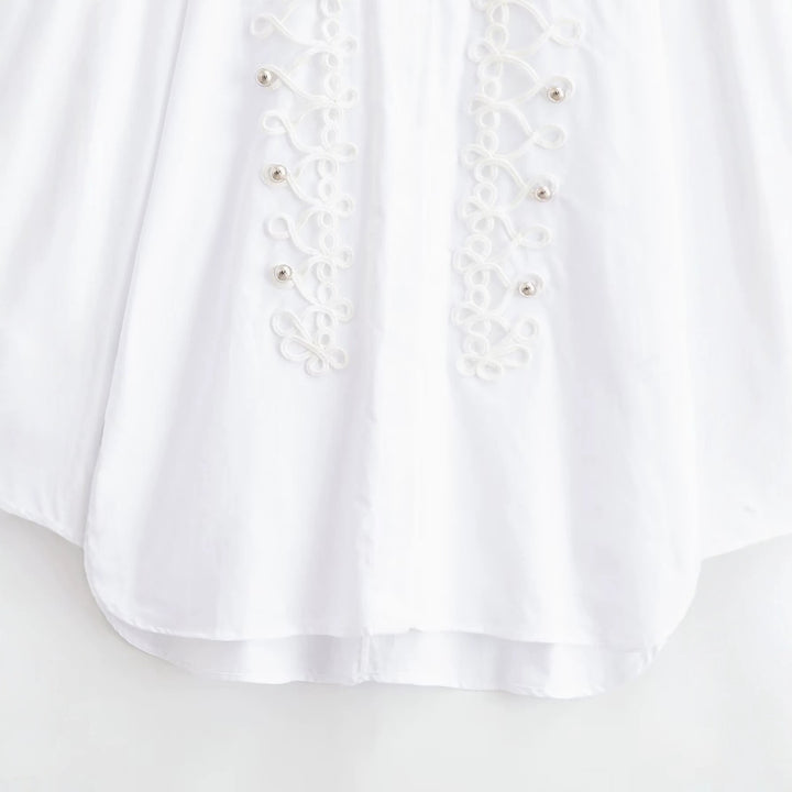 Ladies blouse with decorative frog closures and ornamental cords Mune Fashion