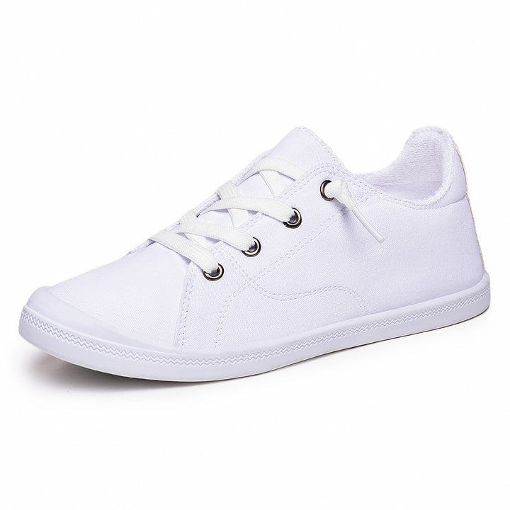 Women’s classic canvas low-top sneakers with reinforced rubber sole, metal eyelets, and padded heel collar Mune Fashion