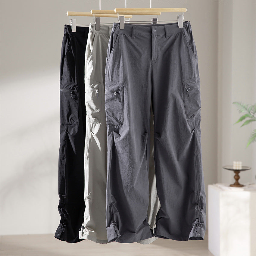 Women's Technical Loose Cargo Pants with Adjustable Hem and Multiple Pockets Mune Fashion
