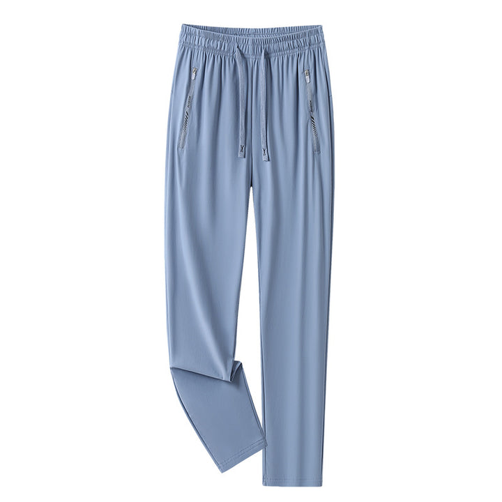 Men's sporty jogging pants with adjustable waistband and zippered pockets Mune Fashion