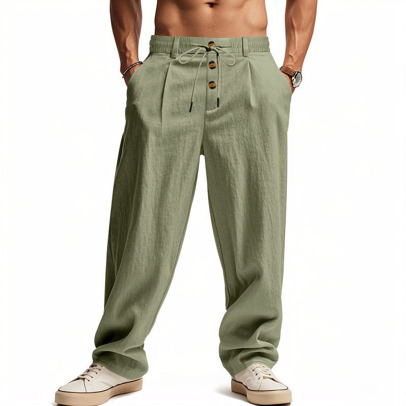 Men's casual pleated pants in linen look with elastic tunnel drawstring, decorative button placket, and deep side pockets Mune Fashion