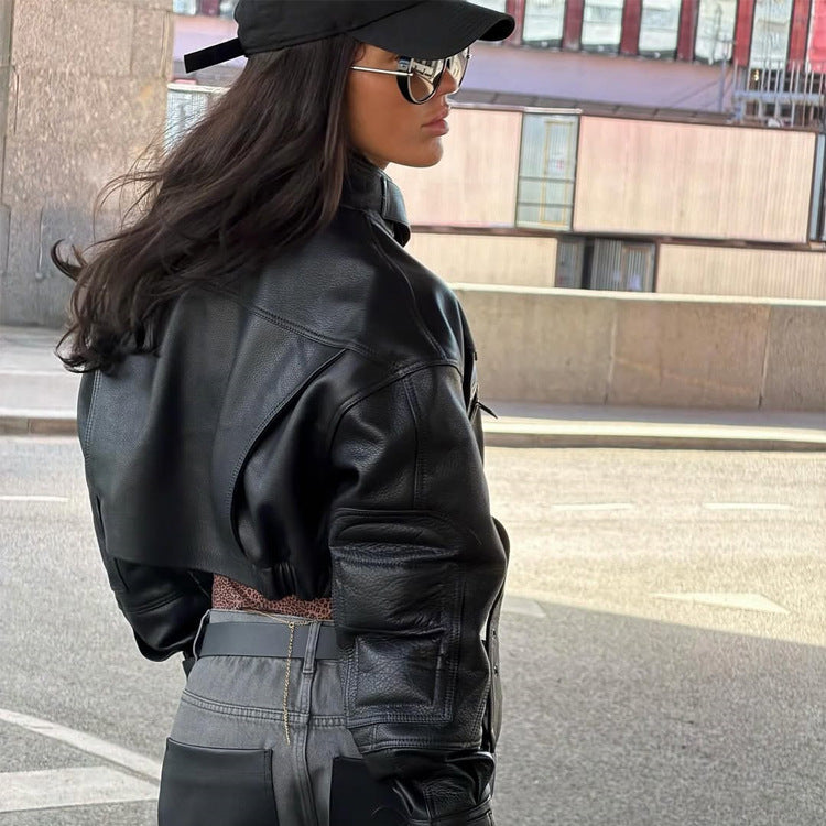 Women Cropped Boxy Biker Jacket made of vegan leather with high standing collar, zippered pockets & buckle detail Mune Fashion