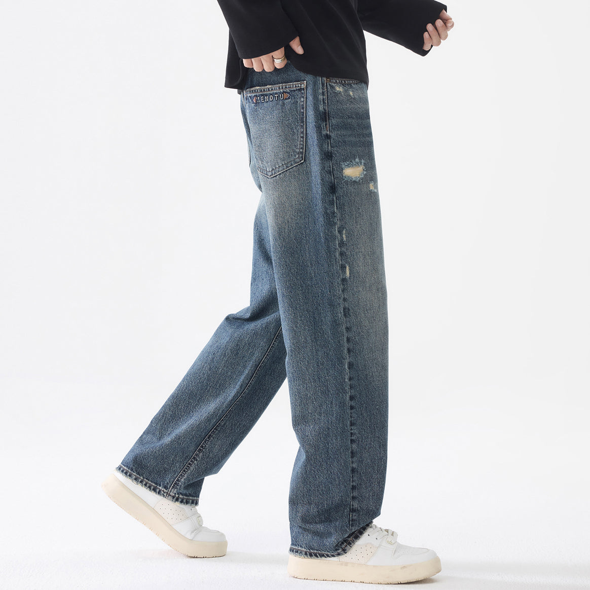 Men's loosely cut baggy jeans made of robust denim with distressed details Mune Fashion
