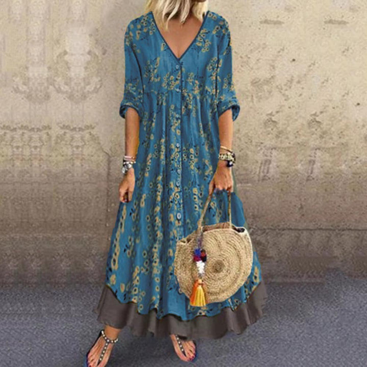 Women’s maxi dress in boho style with V-neck, continuous button placket and tiered skirt Mune Fashion
