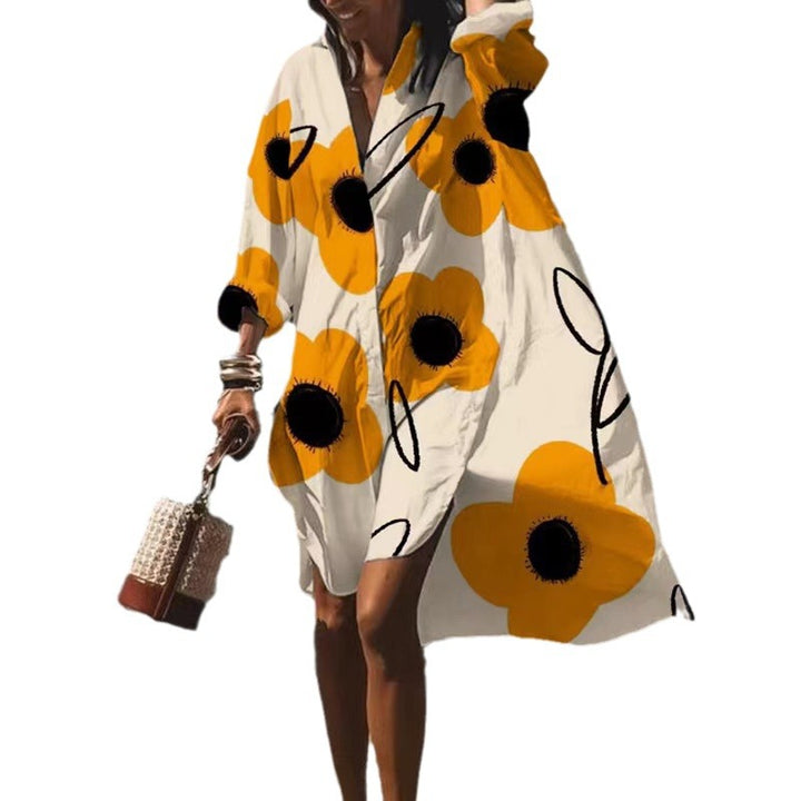 Women's airy beach dress kaftan with tropical leaf print and wide cut Mune Fashion