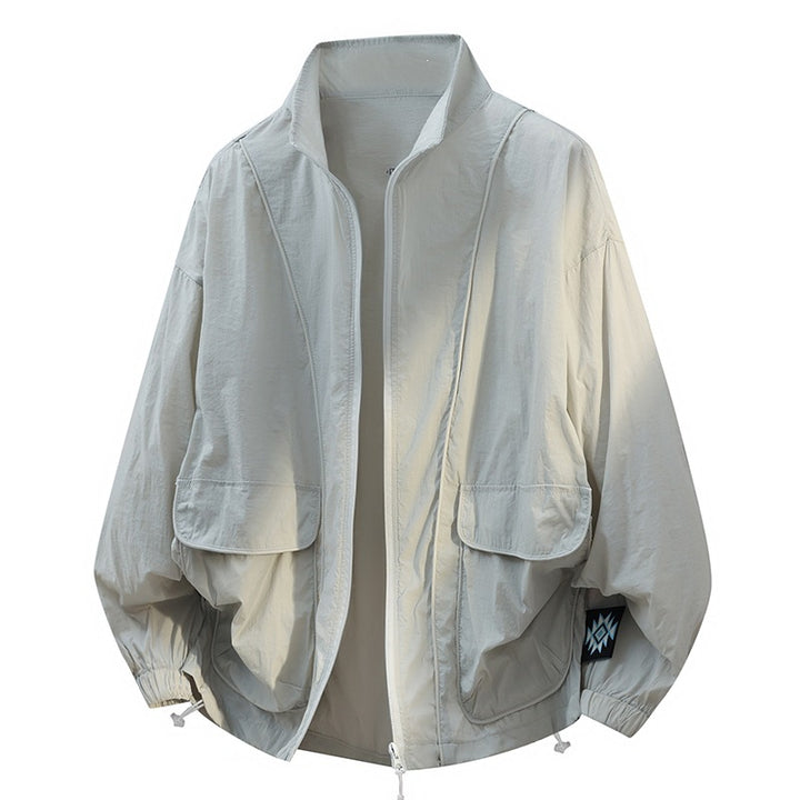 Unisex Oversize Light Windbreaker with Drawstring, Flap Pockets & Elastic Cuffs Mune Fashion