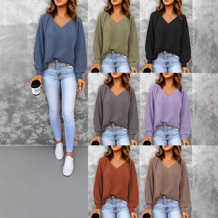 Women's fine structure knit sweater with V-neck, balloon sleeves, and ribbed cuffs Mune Fashion