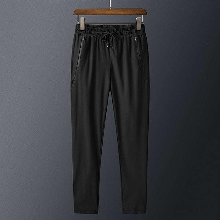 Men's sporty training pants with practical zip pockets Mune Fashion
