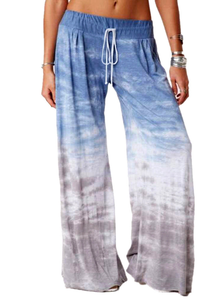 Ladies wide batik pants with drawstring, pleats, and side pockets Mune Fashion
