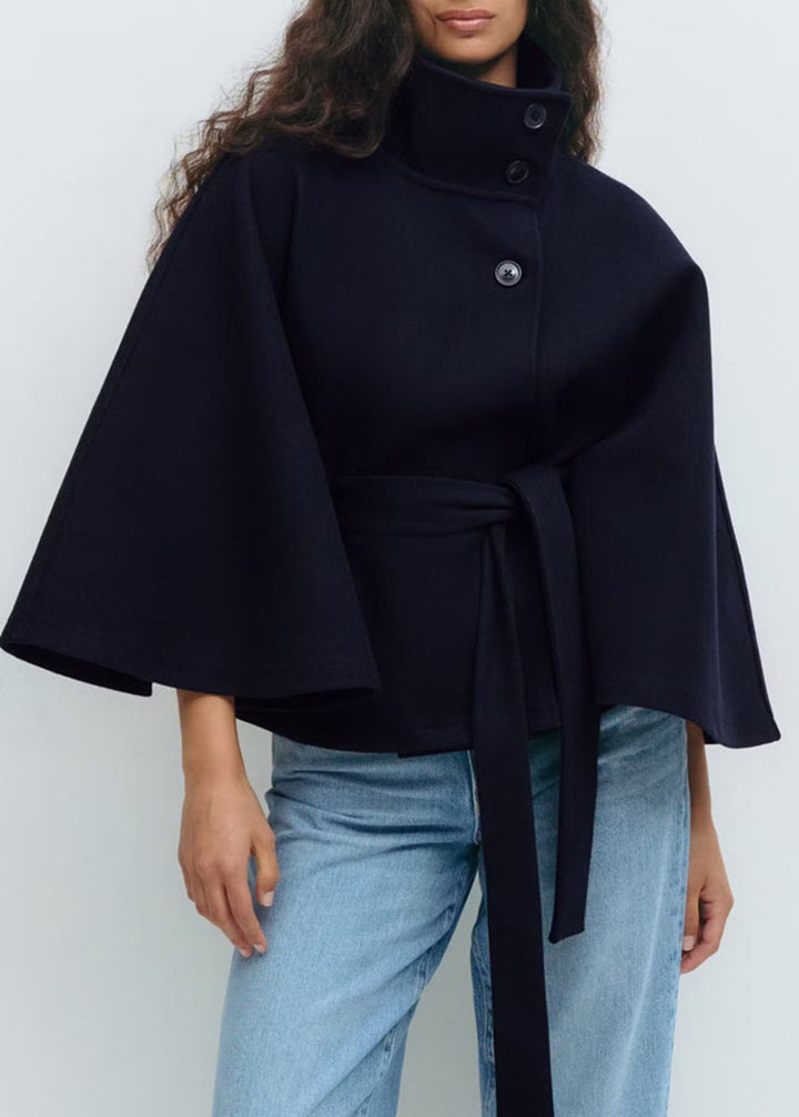 Women's Widely Cut Cape Coat with High Stand-up Collar, Button Placket, and Tie Belt Mune Fashion
