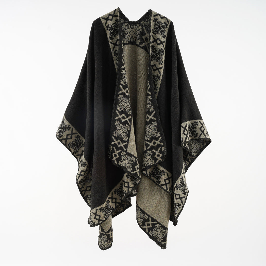 Women's oversized poncho cape made of wool blend with woven border jacquard and decorative chain stitch
