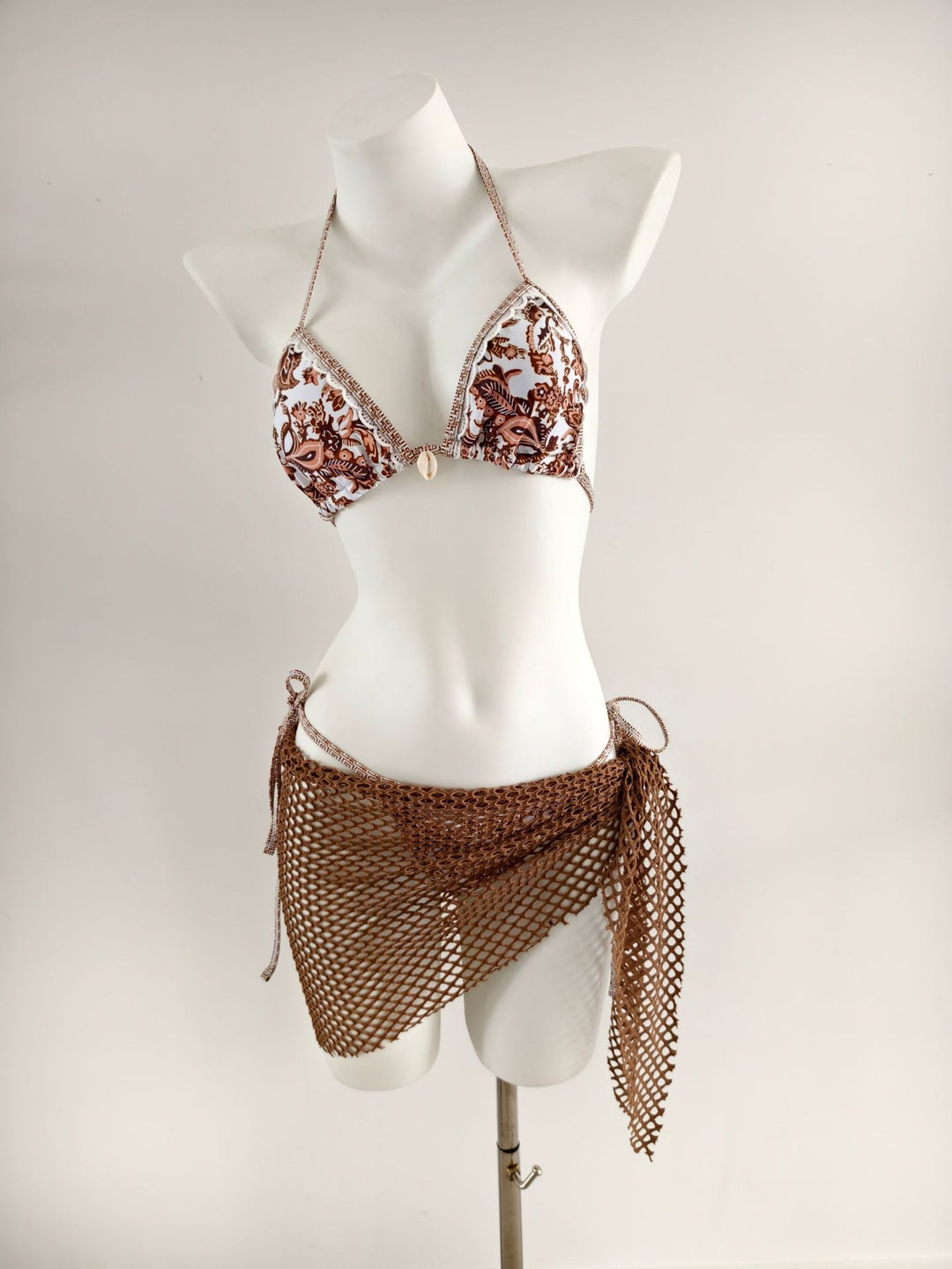 Ladies triangle bikini with trendy net skirt details Mune Fashion