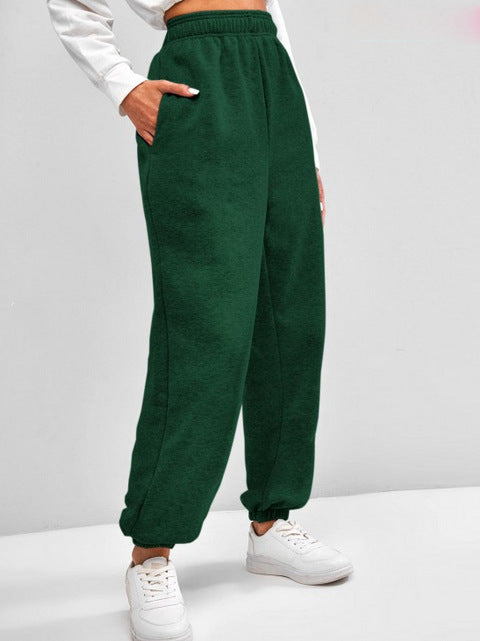 Women's high-cut Relax-Fit jogging pants with elastic waistband, side pockets, and gathered leg cuffs Mune Fashion