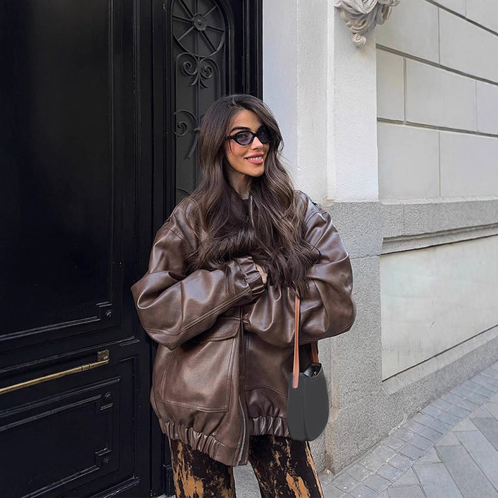 Women's Oversized Vegan Leather Bomber Jacket with Elastic Hem & Large Flap Pockets Mune Fashion