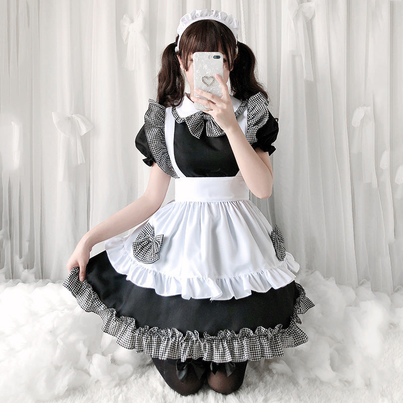 Ladies playful maid dress with ruffle details and bows Mune Fashion
