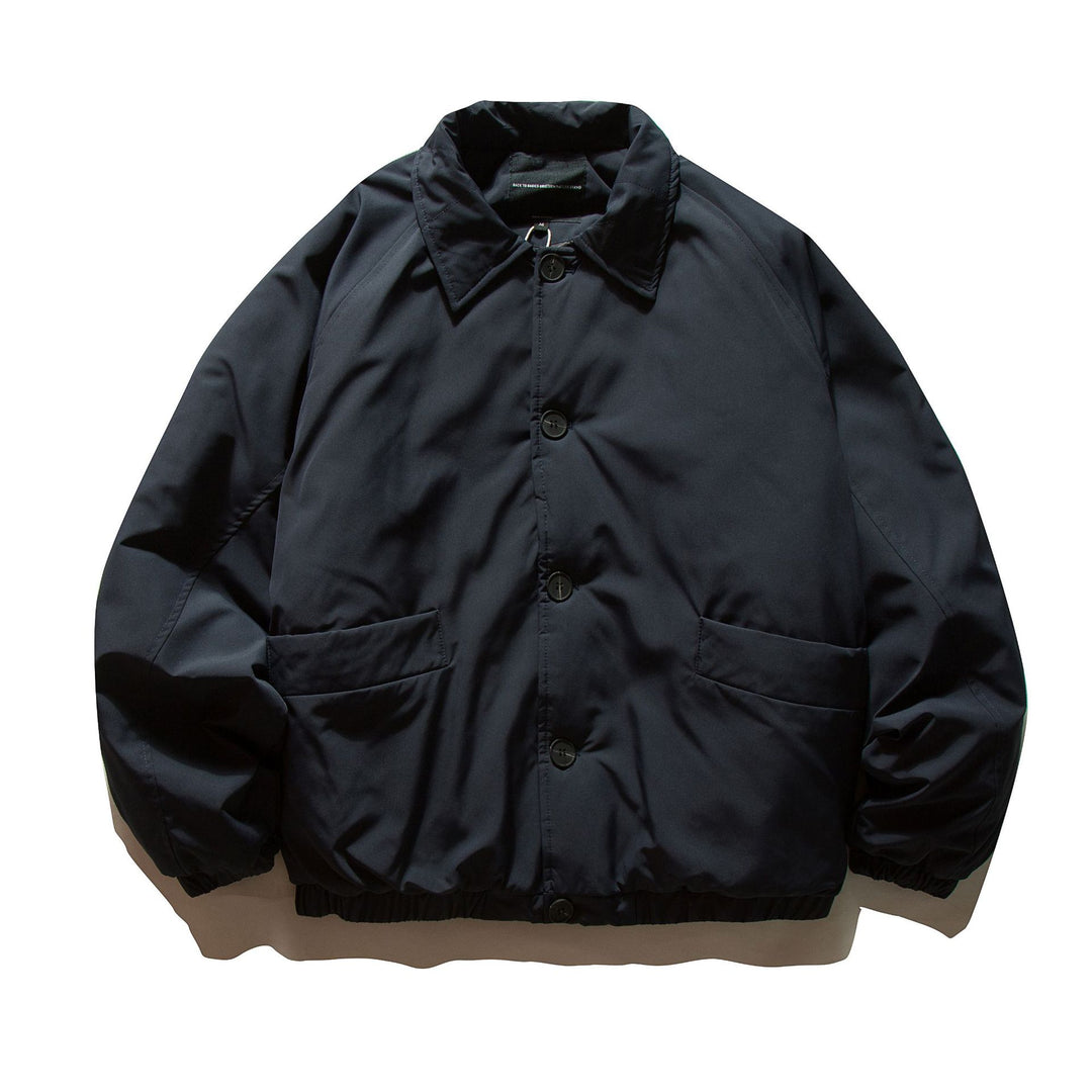 Men's short padded jacket with raglan sleeves, large flap pockets, and elastic hem Mune Fashion