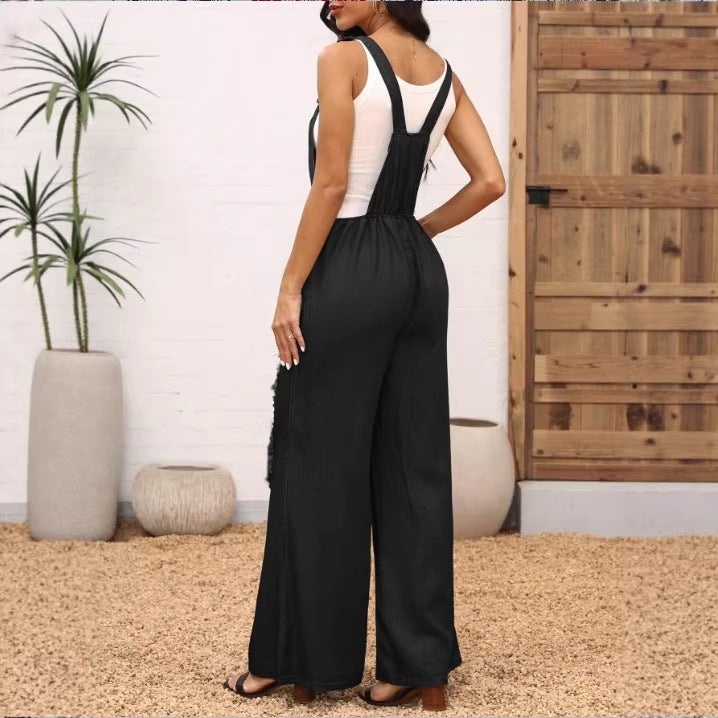 Women's loose distressed overalls with adjustable straps and large knee rips Mune Fashion