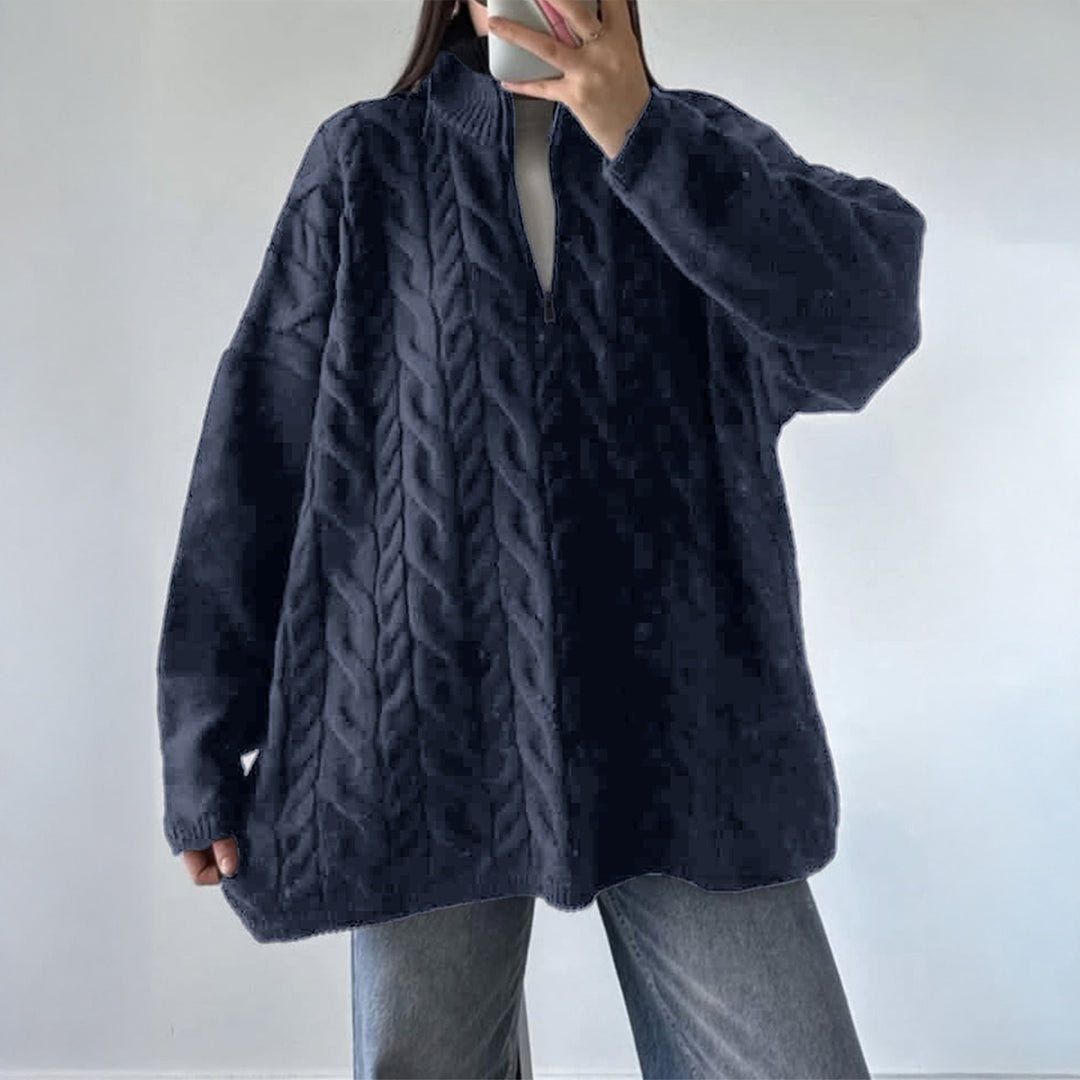 Women's oversized cable knit turtleneck sweater with half zip, high stand-up collar, and rounded hem Mune Fashion