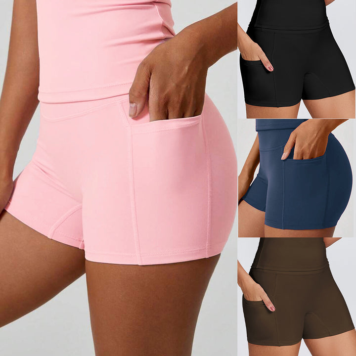 Women’s sporty compression shorts with practical side pockets Mune Fashion