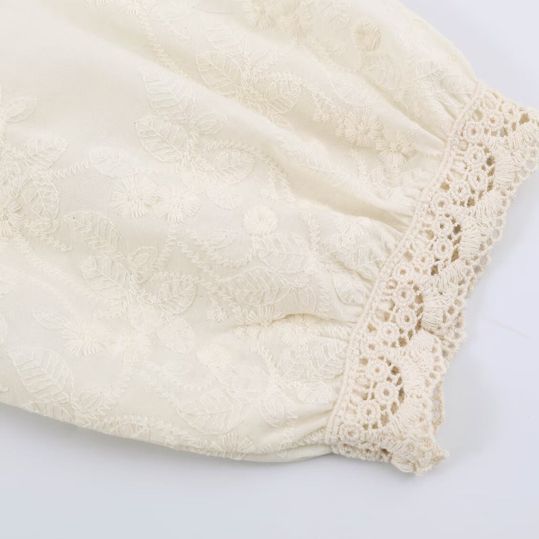 Women's fine knit cardigan in blouse style with embroidered puff sleeves and ruffle hem Mune Fashion